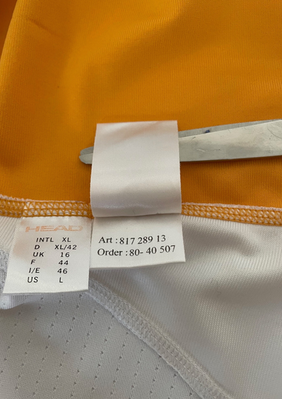 🌟 Polo sportif blanc et orange Taille 42 🌟
