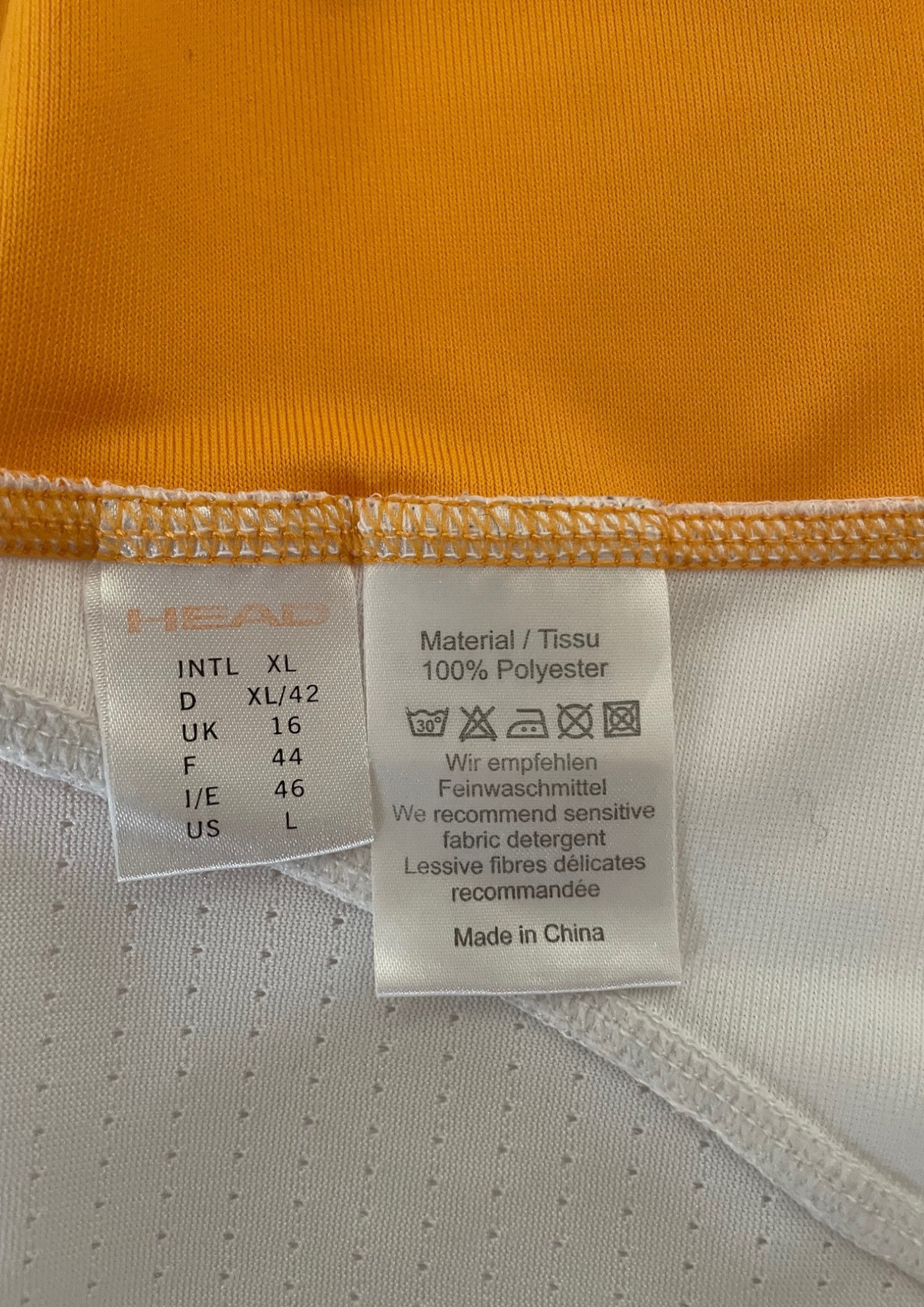 🌟 Polo sportif blanc et orange Taille 42 🌟
