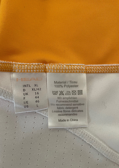 🌟 Polo sportif blanc et orange Taille 42 🌟