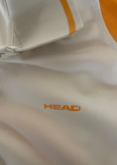 🌟 Polo sportif blanc et orange Taille 42 🌟