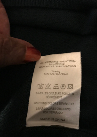 Pull vert foncé avec nœuds dans le dos Taille 36