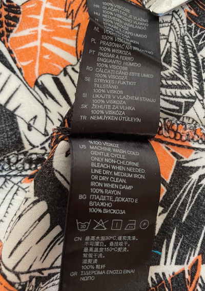 🌀 Haut sans manches à motifs tropicaux Taille 36 🌀