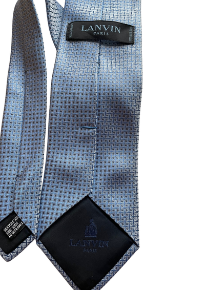 👔✨ Cravate bleue motif géométrique – Élégance & raffinement