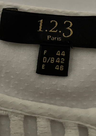 🤍✨ Chemisier blanc chic en dentelle ajourée – Taille 44 ✨🤍