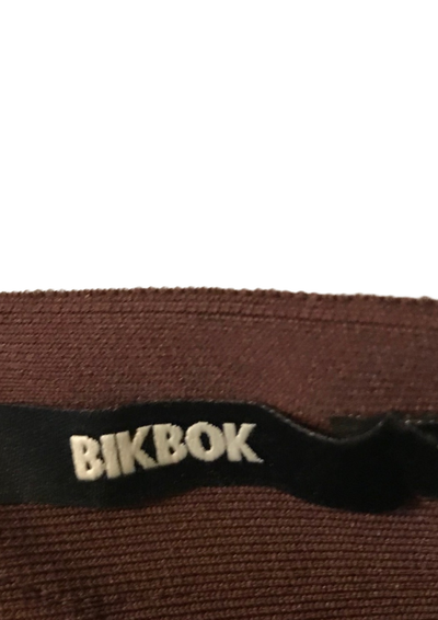 🔥 Jupe moulante bordeaux à détails croisés – Taille XS